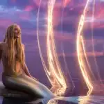 Mermaid Sitting on Rock at Twilight