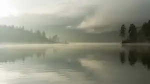 Moody Lake With Soft Mist