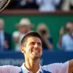Novak Djokovic Smiling After Winning a Match