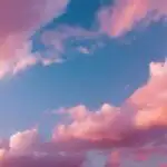 Pastel Pink Clouds In Blue Sky