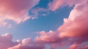 Pastel Pink Clouds In Blue Sky