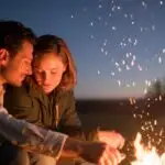 Romantic Night Sitting by a Campfire