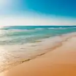 Serene Lagoon with Golden Shoreline