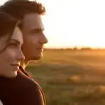 Soft Hug at Sunrise in Open Field