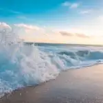 Summer Waves Crashing on Bright Blue Coast