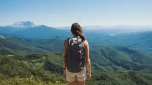 Traveler Girl Looking At Mountain View Back