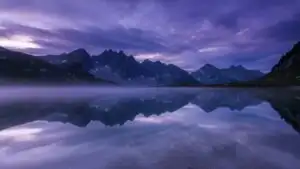 Water Reflections Under Purple Sky