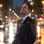 Man Standing in Rain