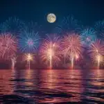 Summer Fireworks Over Water Reflection