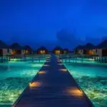 Tropical Island Overwater Bungalows at Night