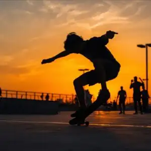 Skater Boy Doing Trick Sunset Silhouette