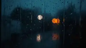 Water Drops Sliding Down Window Pane