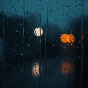 Water Drops Sliding Down Window Pane