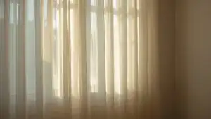 Faint Light Behind Curtains