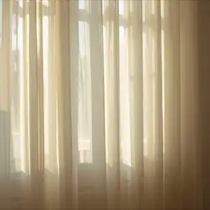Faint Light Behind Curtains
