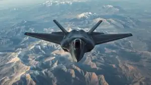 A Stealth Bomber Flying Low Over a Mountain Range
