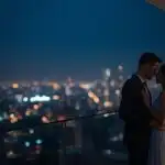 Distant City Lights Blurred Couple Balcony View Night