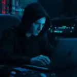 Hacker Hoodie Laptop Dark Room