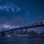 Low Clouds Over City Bridge