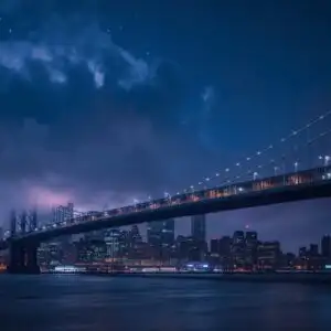 Low Clouds Over City Bridge