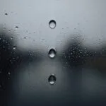 A Single Tear Running Down a Rainy Window