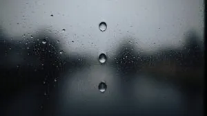 A Single Tear Running Down a Rainy Window