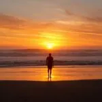Alone at Sunset Beach Waves Crashing