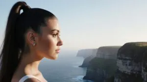 Ariana Grande Gazing at the Horizon on Cliffs