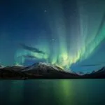 Aurora Borealis Northern Lights Over Mountain Lake