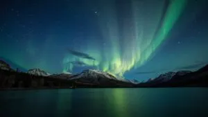 Aurora Borealis Northern Lights Over Mountain Lake
