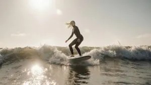 Billie Eilish Surfing Small Waves Morning Light