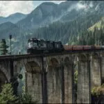 Cargo Train Crossing Mountain Bridge