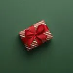 Close-Up of a Perfectly Wrapped Gift with Red Ribbon