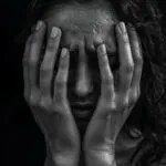 Crying Woman Hands Over Face Black and White