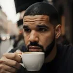 Drake Drinking Espresso at a Street Café in Rome