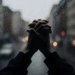 Hands Clasped Rainy Window Reflection Urban