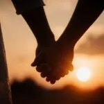 Hands Entwined at Sunset