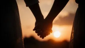 Hands Entwined at Sunset