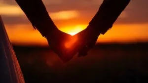 Hands Intertwined at Sunset