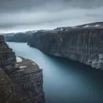 Jagged Fiords of Norway Under Clouds
