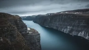Jagged Fiords of Norway Under Clouds