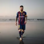 Lionel Messi Walking Barefoot on a Quiet Beach