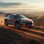 Rally Car Jumping Over Dirt Hill