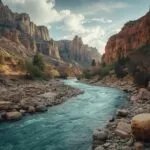 River Flowing Through Rocky Canyon Landscape