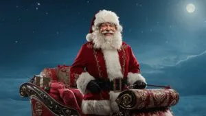 Santa’s Sleigh Crossing Winter Sky