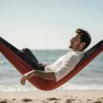 Timothée Chalamet Lounging in a Hammock by the Sea