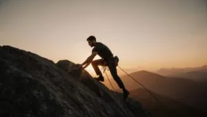 Tom Holland Climbing Rocky Hill at Dawn