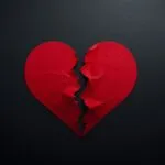 Torn Red Paper Heart Dark Table