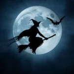 Witch Silhouette Flying Over Full Moon